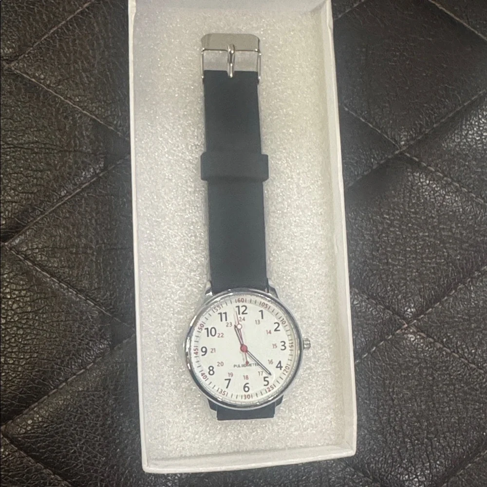 Black and Silver Watch Used in a good condition